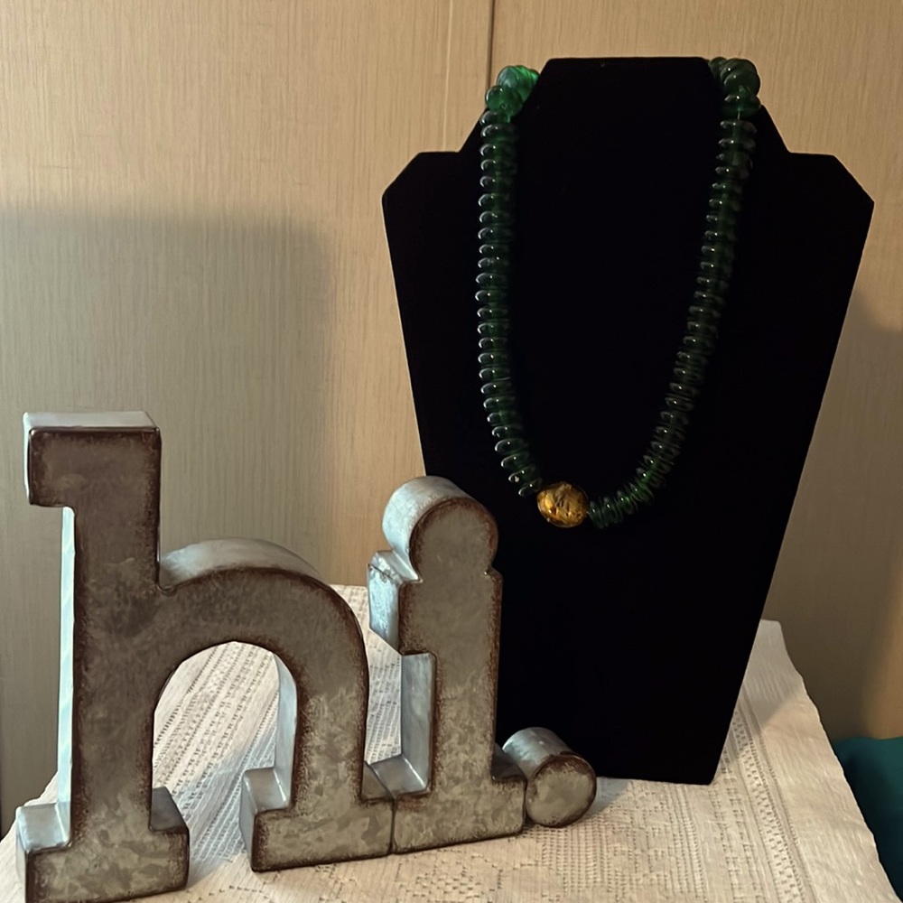 🌻3 for$15🌻 Chunky dark green necklace with multi color medallion in center.